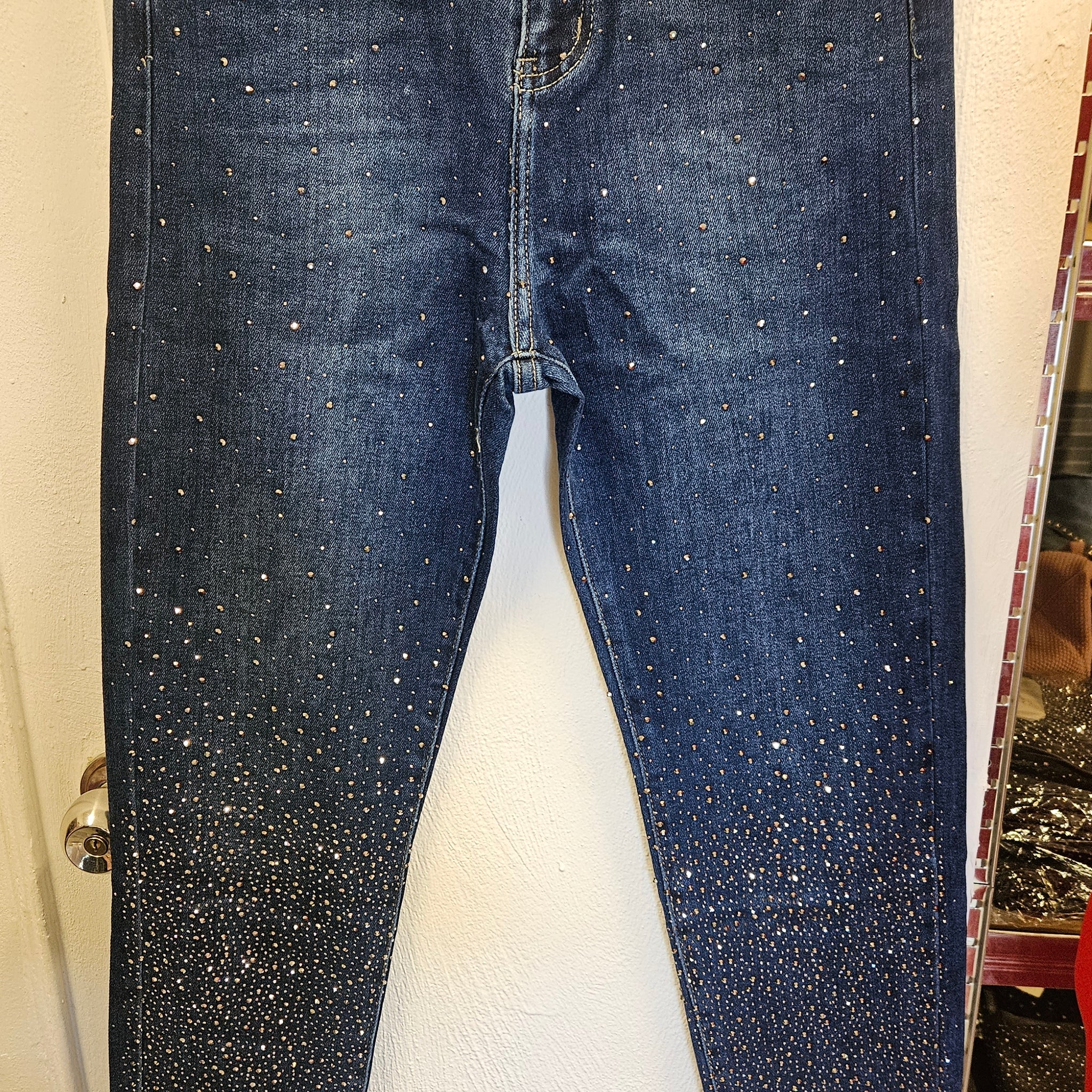 Pantalón pitillo brillante